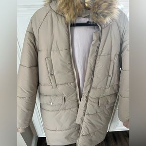 Tan winter puffer coat with removable fur hood.